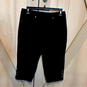 White House Black Market Black Slim Capri with 3 silver studs at leg.